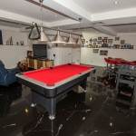 Modern-Architectural-new-home-brisbane-mancave-games-room-black-floor-pool-room-poker-room-rumpus.jpg