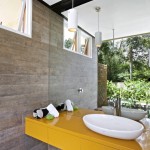 Renovation-Tarragindi-outdoor-bathroom-yellow-vanity-mirror-garden-pendant