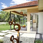 Renovation-Tarragindi-sculpture-backyard-steppingstones-pendants-lawn-outdoor-living